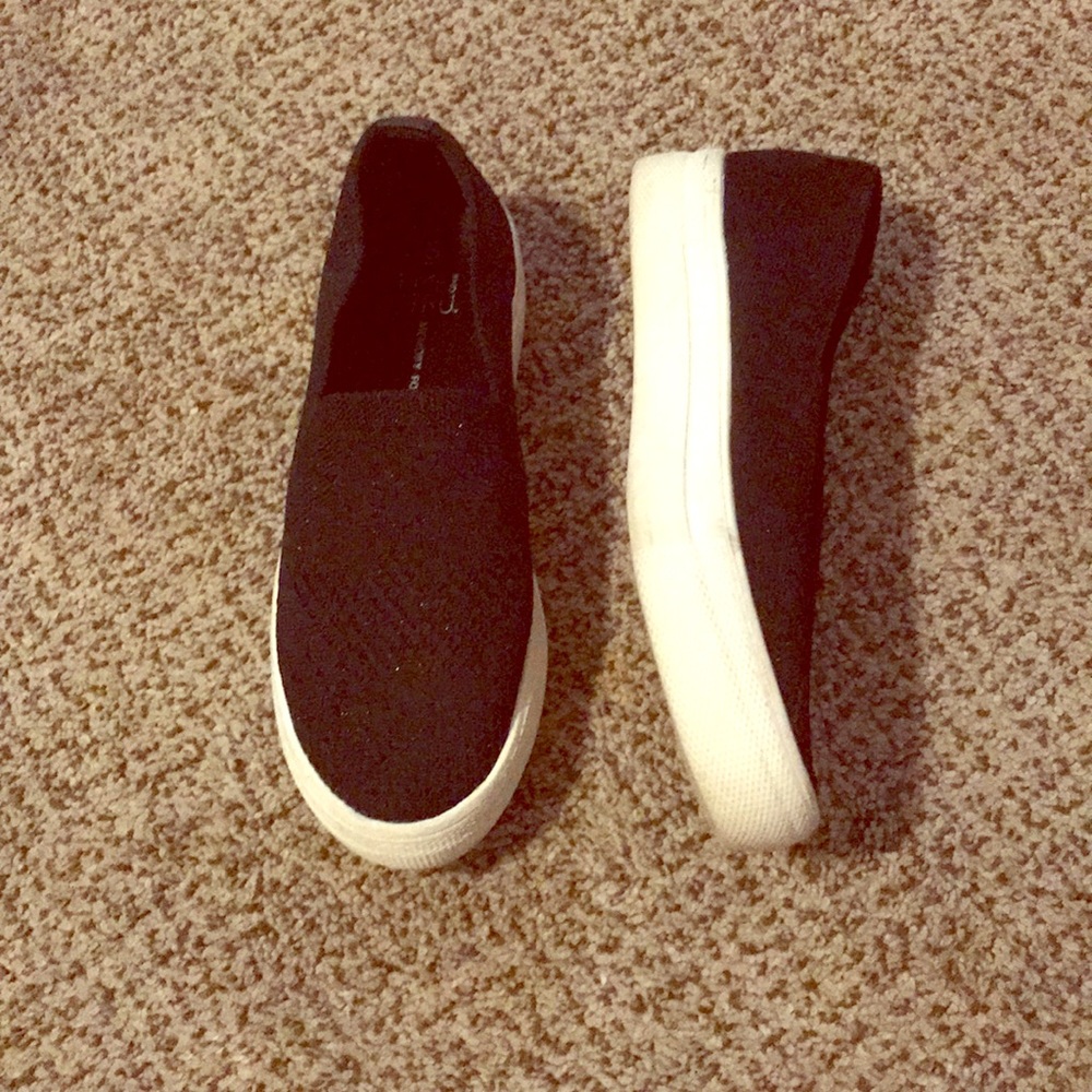 Black platform slip on’s